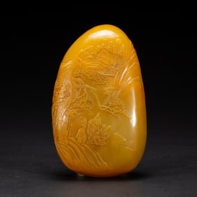 A CARVED TIANHUANG BOULDER
