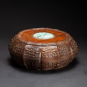 A CARVED JADEITE INLAID HUANGHUALI BOX WITH COVER