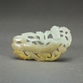 A CARVED WHITE JADE APSARAS