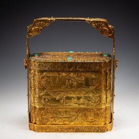A BRONZE-GILT PICNIC BOX