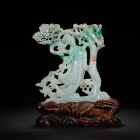 A CARVED JADEITE DECORATION