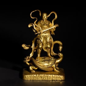 A BRONZE-GILT FIGURE OF XUANWU