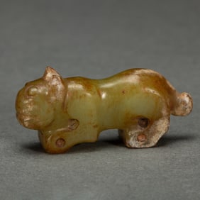 A CARVED JADE BEAST