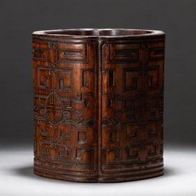 A CARVED HUANGHUALI BRUSHPOT