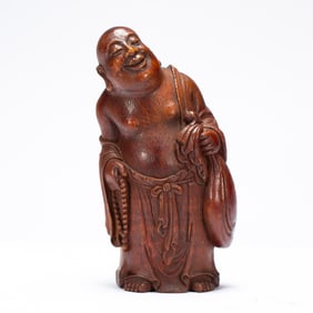 A CARVED BAMBOO BUDAI