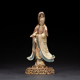 A CARVED SHOUSHAN STONE GUANYIN