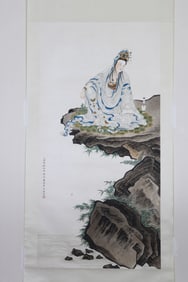 A CHINESE PAINTING OF GUANYIN SIGNED HUANG JUN