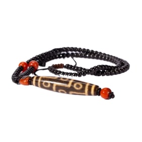 A TIBETAN DZI BEAD NECKLACE