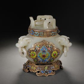 A CARVED WHITE JADE CENSER