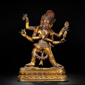 A BRONZE-GILT STANDING VAJRAKILA