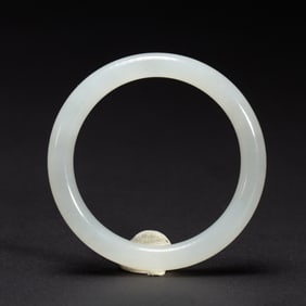 A WHITE JADE RING HUAN