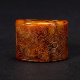 A CARVED JADE ORNAMENT