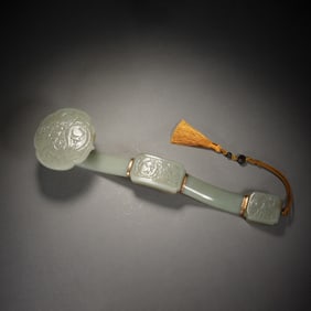A CARVED WHITE JADE RUYI SCEPTER