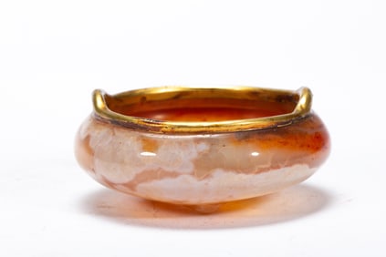 A CARVED AGATE CENSER