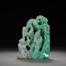 A CARVED JADEITE DECORATION