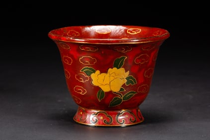 A POLYCHROME LACQUER PAINTED CUP
