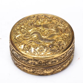 A BRONZE-GILT DRAGON BOX WITH COVER