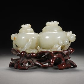 A CARVED WHITE JADE CONJOINED VESSEL
