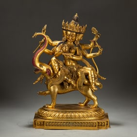 A BRONZE-GILT FIGURE OF PROTECTOR