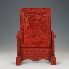 A CARVED CINNABAR LACQUER TABLE SCREEN