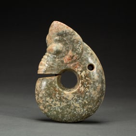 A CARVED JADE PIG-DRAGON