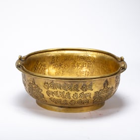 A BRONZE-GILT BOWL