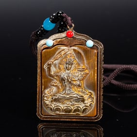 A CARVED WOODEN MANJUSRI PLAQUE