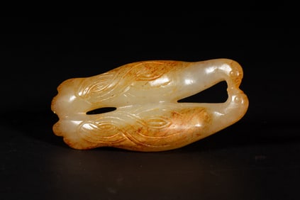 A CARVED JADE MYTHICAL BIRDS ORNAMENT