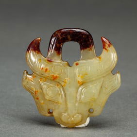 A CARVED JADE ORNAMENT