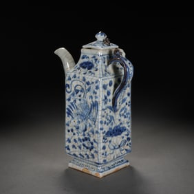 A BLUE AND WHITE PHOENIX EWER