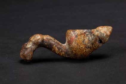 A CARVED JADE ORNAMENT