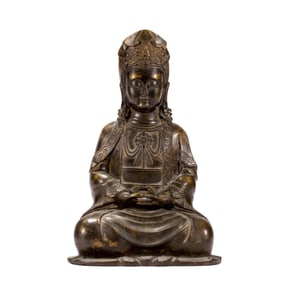 A BRONZE SEATED GUANYIN