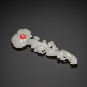 A CARVED WHITE JADE LINGZHI SCEPTER
