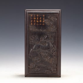 A CARVED AND INSCIRBED ROSEWOOD ZITAN KYLIN BOX WITH COVER
