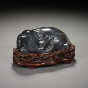 A CARVED JADE ELEPHANT