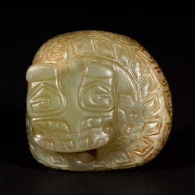 A CARVED JADE BEAST