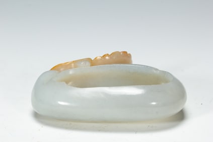 A CARVED JADE WASHER