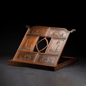 A CARVED HUANGHUALI MIRROR STAND