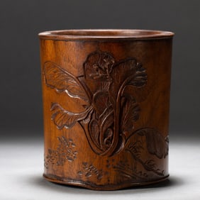 A CARVED HUANGHUALI BRUSHPOT