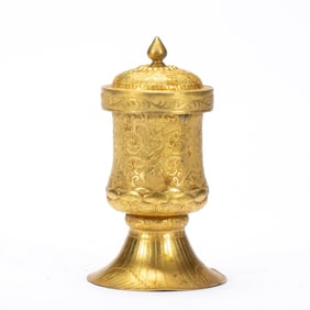 A BRONZE-GILT WINE CUP WITH COVER
