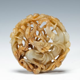 A CARVED WHITE JADE PLAQUE