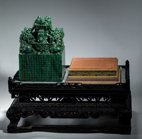 A FINE CARVED JADEITE DRAGON SEAL