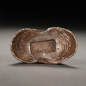 A CHINESE SILVER INGOT
