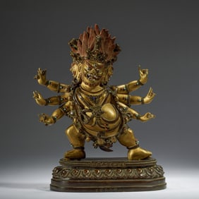 a SINO-TIBETAN BRONZE-GILT figure of Hayagriva