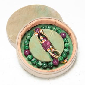 A CHINESE IMPERIAL JADEITE PRAYER BEAD SHOUCHUAN