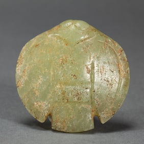A CHINESE ARCHAISTIC JADE MYTHICAL BIRD