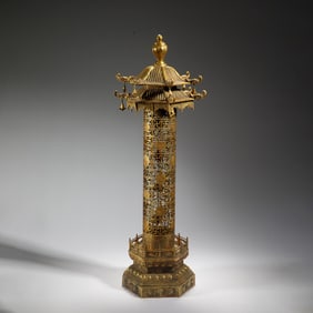 A BRONZE-GILT PAGODA FORM INCENSE BURNER