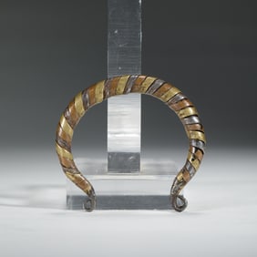 A TRIPLE BRONZE BANGLES