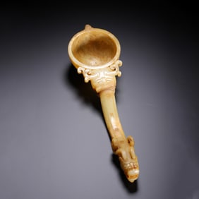 A VERY RARE CARVED JADE SPOON