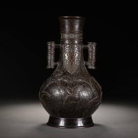 A BRONZE TUBULAR VASE